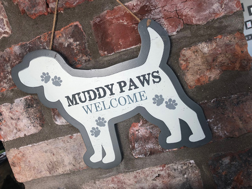 The Cowshed Muddy Paws Logo
